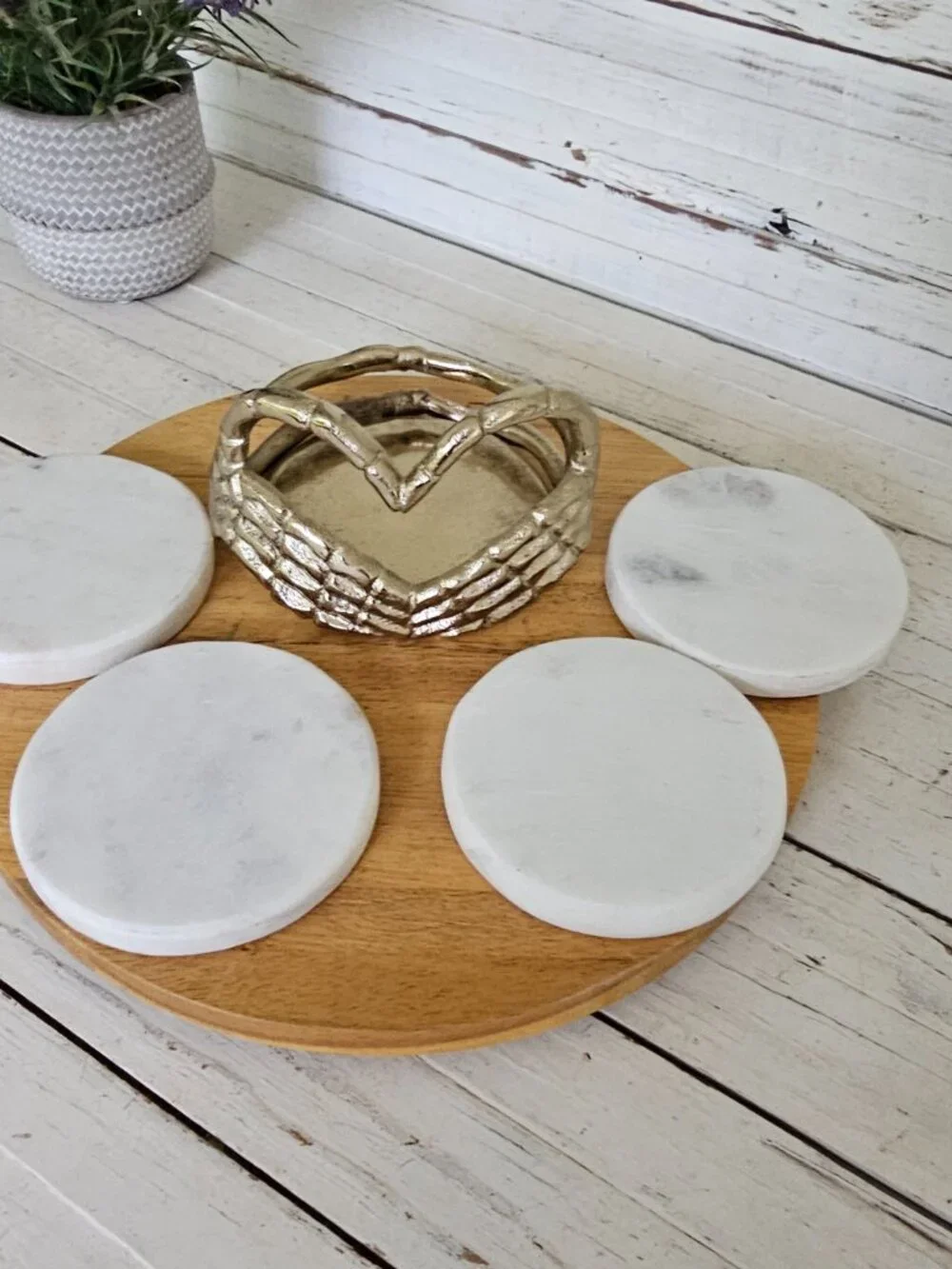 Metal Skeleton Hand Heart Shape Holding Set of 4 White Marble Coasters